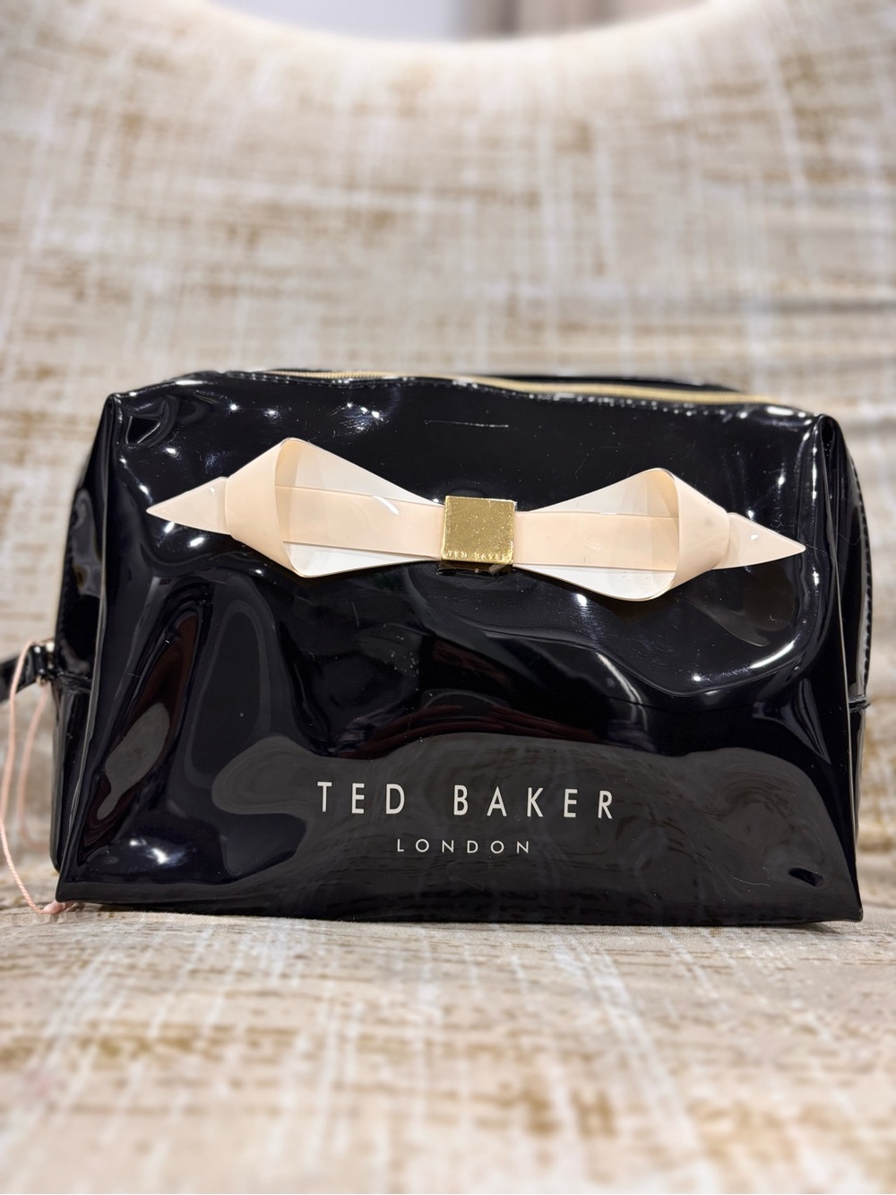 Ted Baker Black Patent Toiletry Pouch with Cream Bow Accent